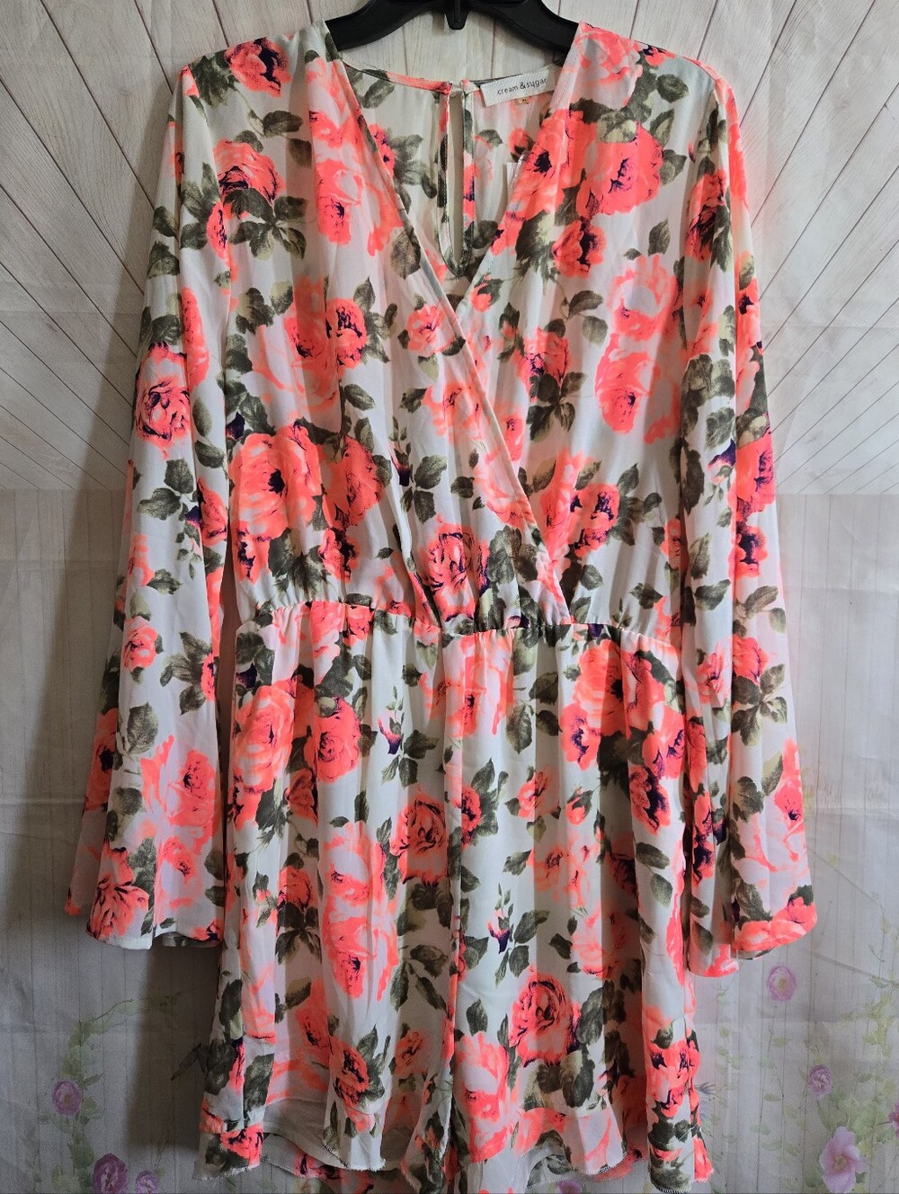 Cream & Sugar Floral Wrap Romper in Neon Coral and Olive Bell Sleeves